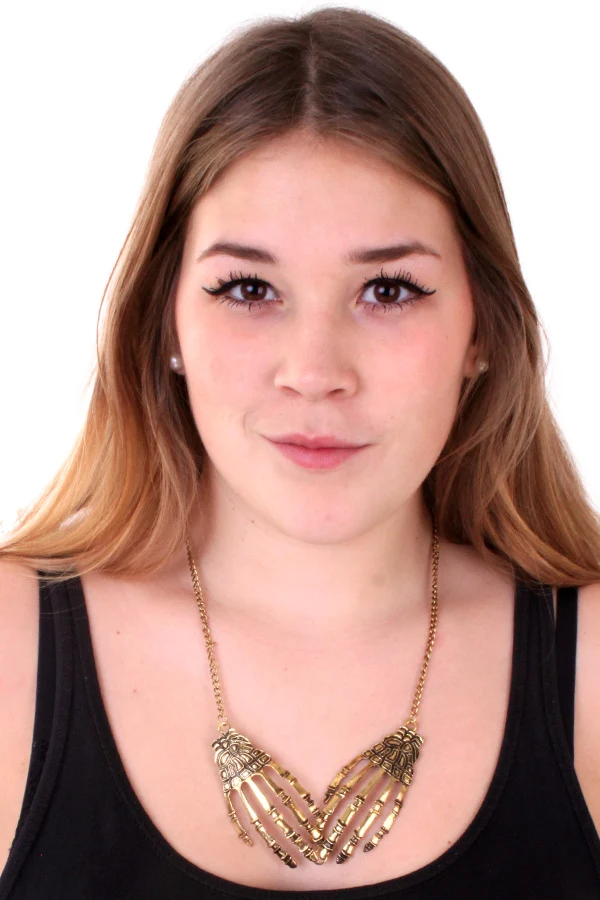 Skeletketting goud met skelethandjes voor dames