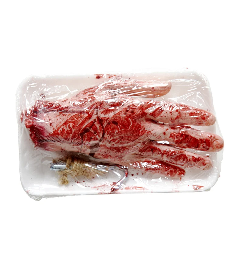 Afgehakte hand met bloed ingepakt
